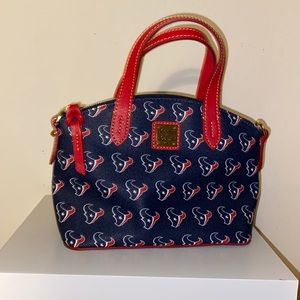 Dooney & Bourke Texans purse. Never been used. Completely new!
